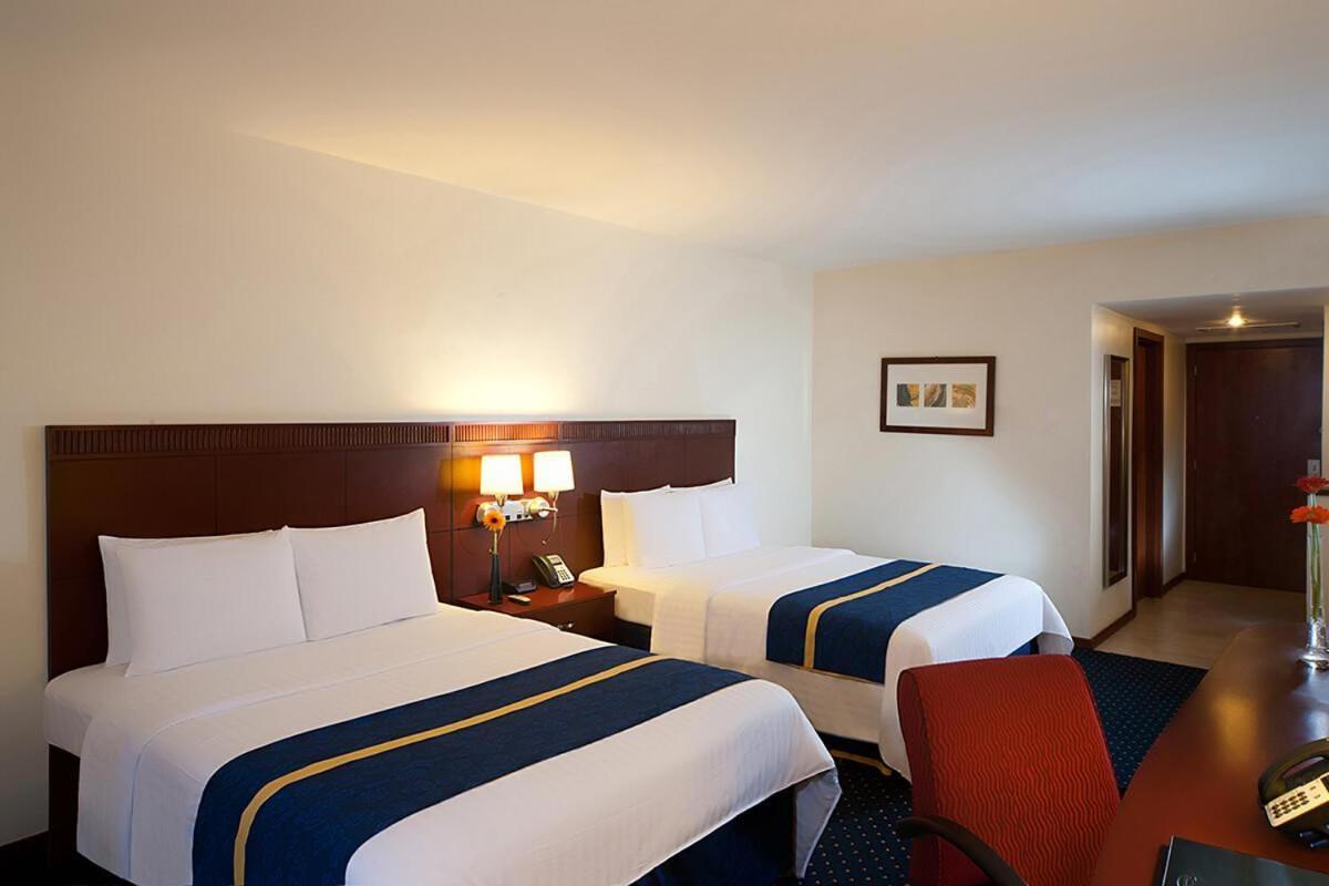 Hodelpa Garden Court Hotel Santiago De Los Caballeros Bagian luar foto